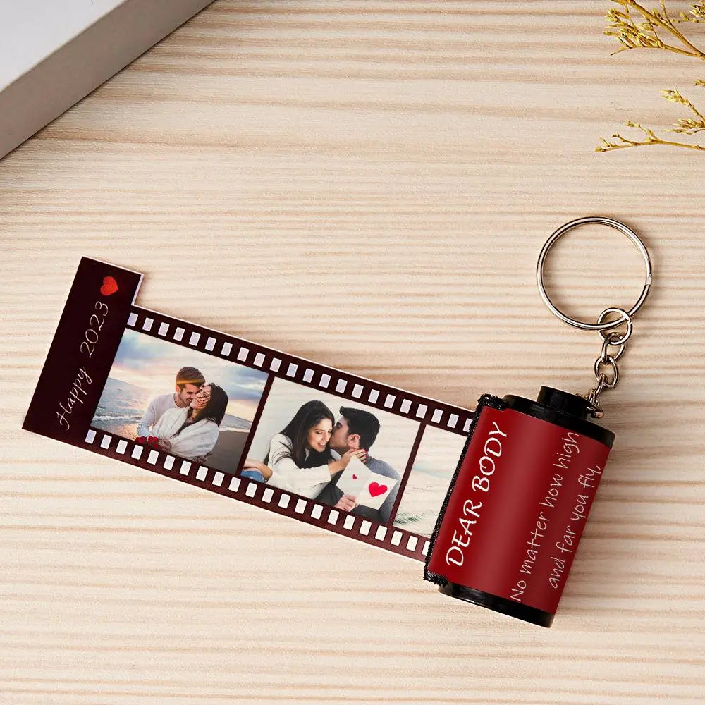 MadeMine personalized photo film roll keychain with a gift box, featuring a custom photo and compact, lightweight design.