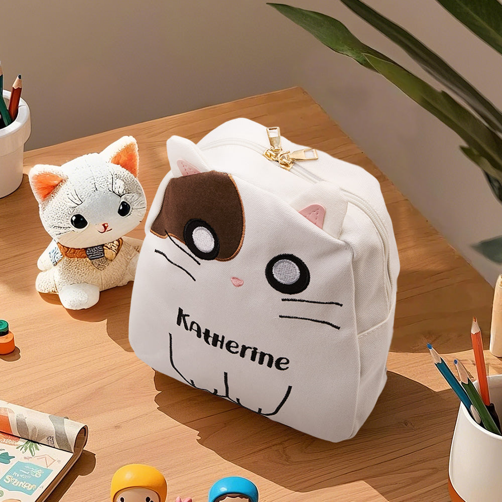 MadeMine personalized cat embroidery backpack for kids with custom name, featuring a playful cat design and adjustable straps.