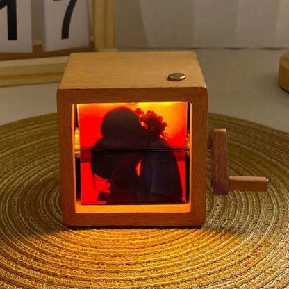 MadeMine custom photo flipbook frame with hand-crank animation box, featuring a light for personalized animated photo display.