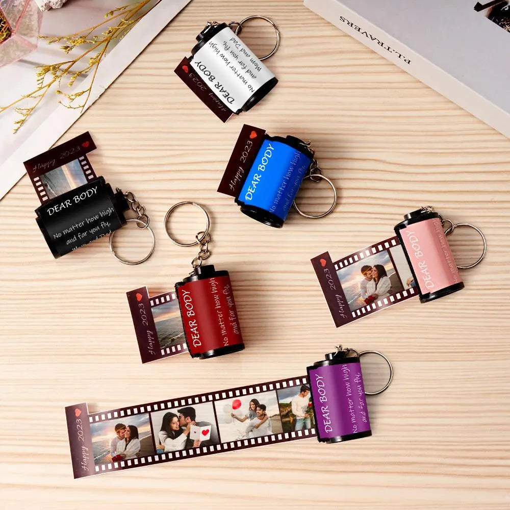 Personalized MadeMine keychain with photo film roll design and gift box, featuring custom photo display and silver-tone hardware.