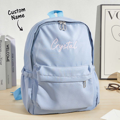 Personalized MadeMine embroidery name backpack for kids, custom canvas school bag with colorful design and adjustable straps.