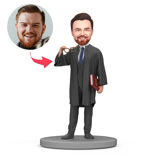 Zwarte advocaat bobblehead van MadeMine met naamgravure en tekst, gedetailleerde afbeelding van de gepersonaliseerde bobbelpop.
