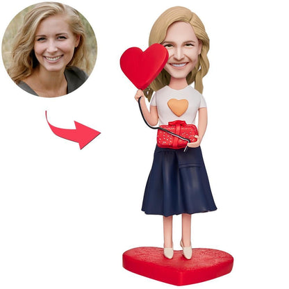 Beautiful Girl Holding a Gift Box and a Love Heart Custom Bobbleheads With Engraved Text