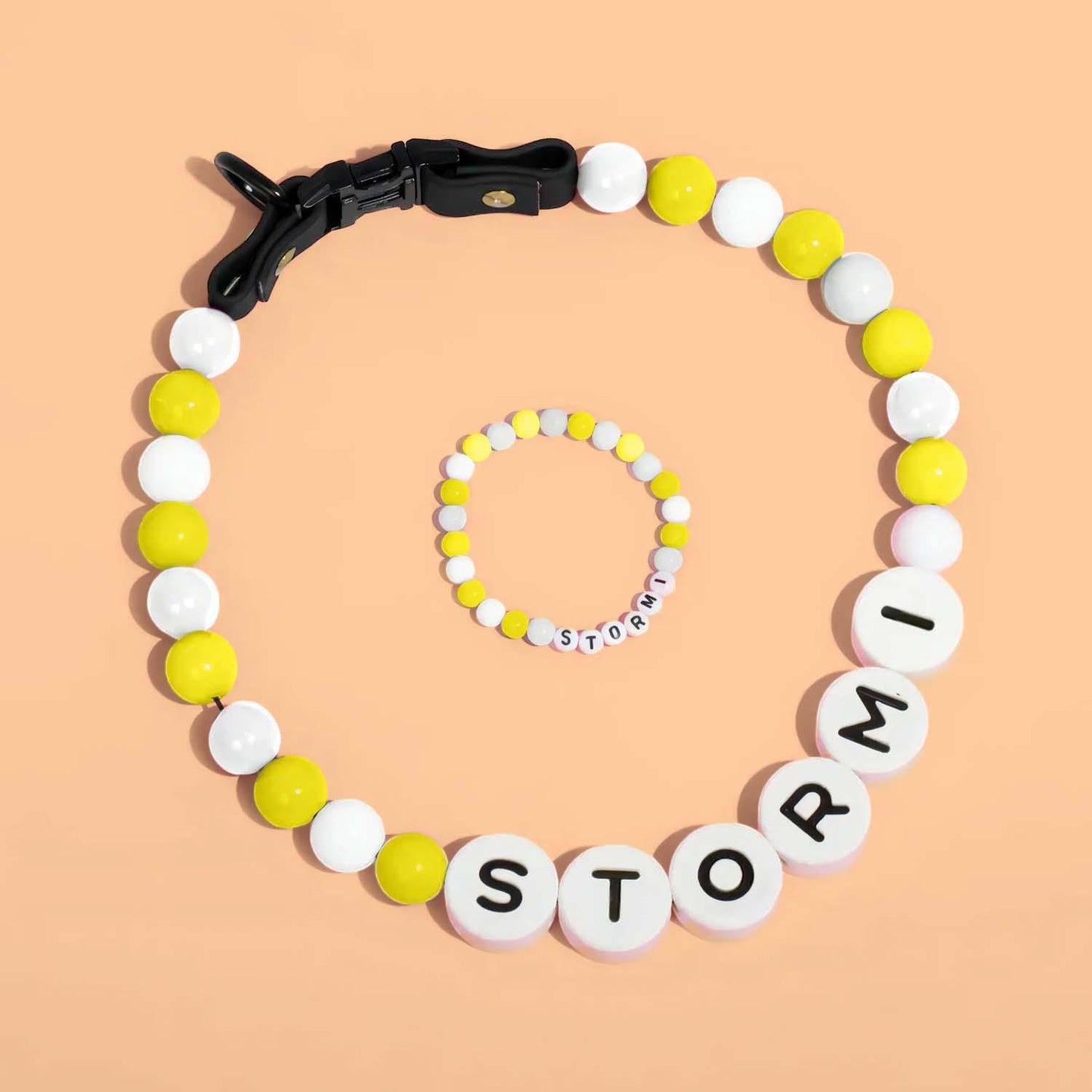 Personalized pet name necklace and matching bracelet by MadeMine, featuring custom pet name charms on jewelry set.