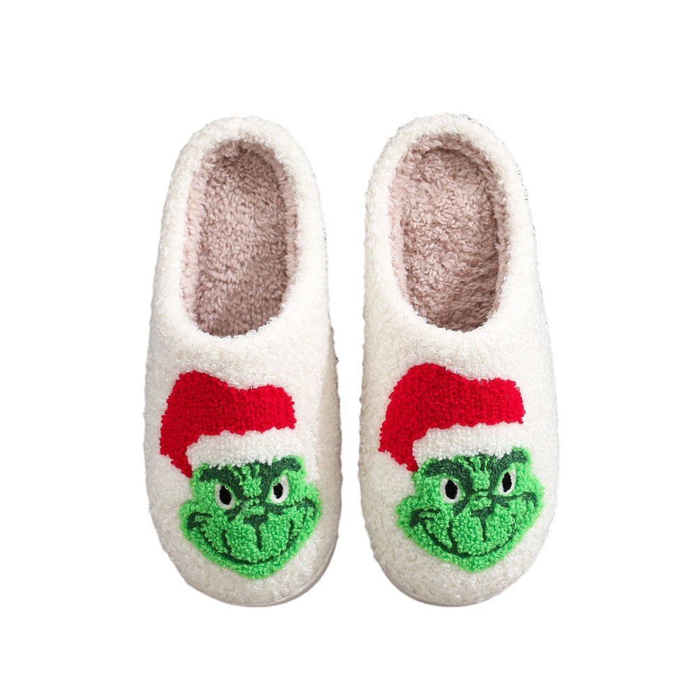 MadeMine Christmas Grinch slippers with cotton material, featuring festive green and red design, perfect for holiday home comfort.