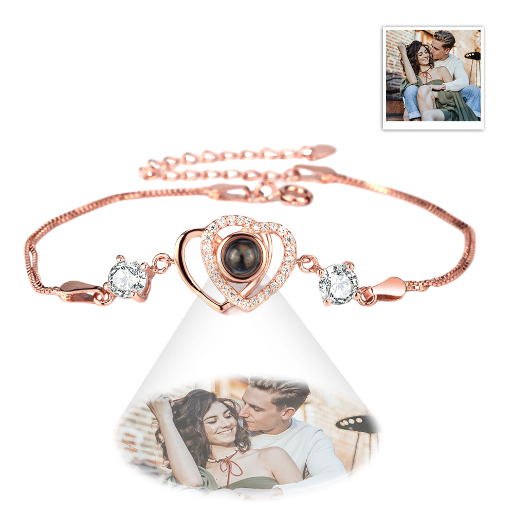 Custom double heart projection bracelet made of 925 sterling silver by MadeMine, featuring engraved hearts and intricate detailing.